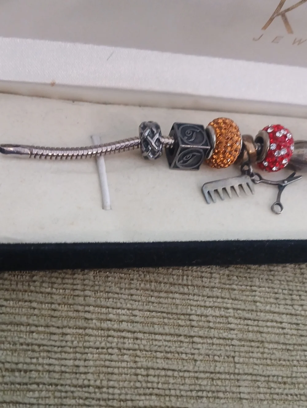 Kay Jewelers Silver Bracelet with Red and Gold Charms